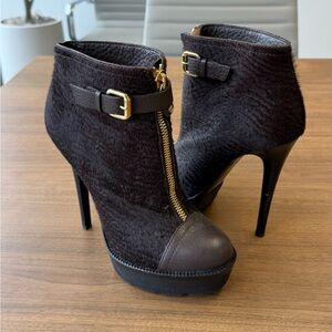 Chic Black Heeled Boots with Gold Buckle